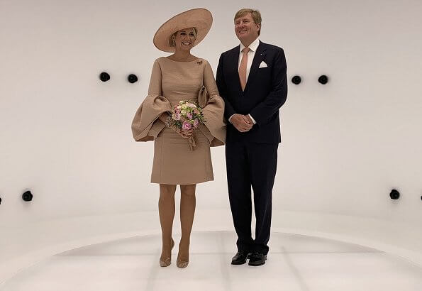 Brandenburg's Prime Minister Dietmar Woidke and his wife Susanne Woidke. Queen mMaxima wore Natan dress
