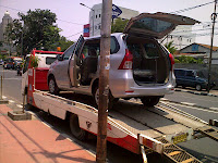 Pengiriman Avanza B 1850 SRF Padang Via truk Towing