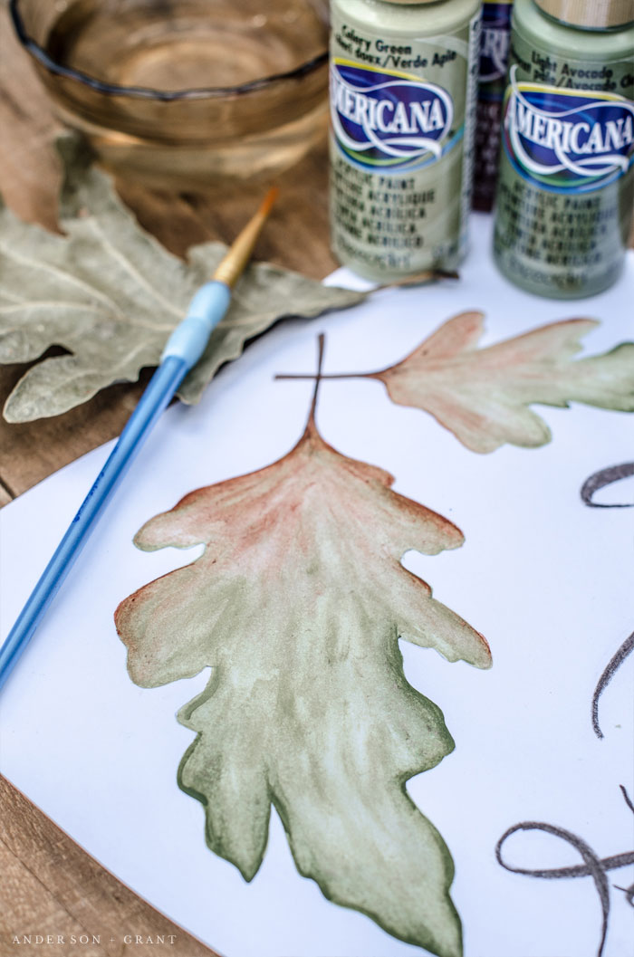 Watercolor leaves and paintbrush