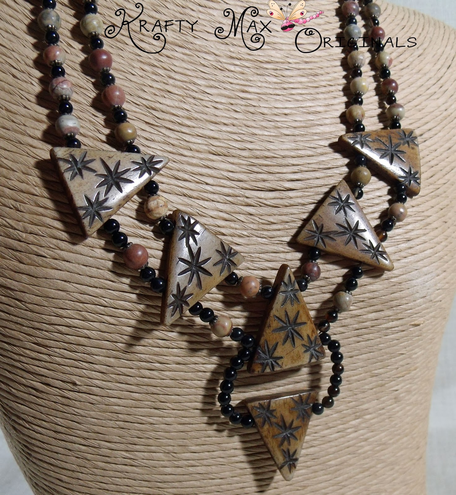 http://www.lajuliet.com/index.php/2013-01-04-15-21-51/ad/gemstone,92/exclusive-bone-triangle-detailed-and-gemstone-necklace-set-a-krafty-max-original-design,133