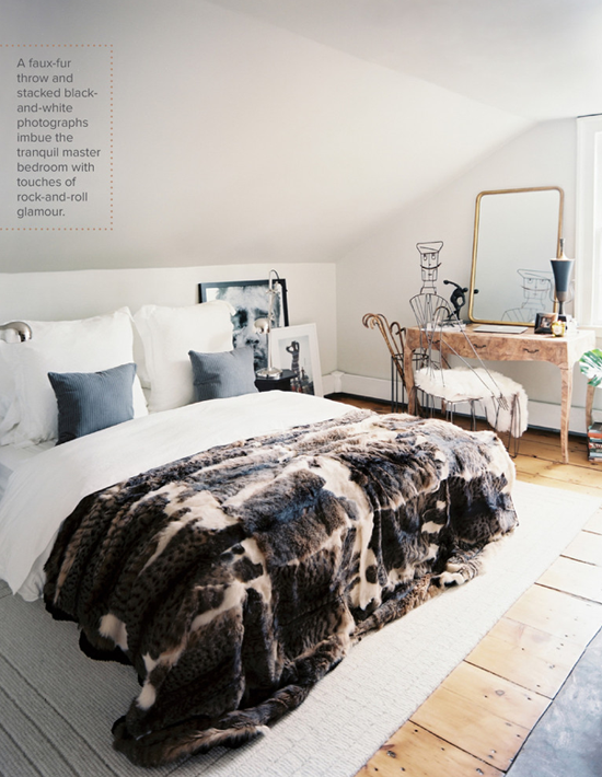 Faux fur throw and an eclectic bedroom decor via Lonny