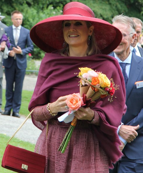 Queen Maxima presents a new rose during the Dutch Rose Association's National Symposium at the Rosarium in Winschoten