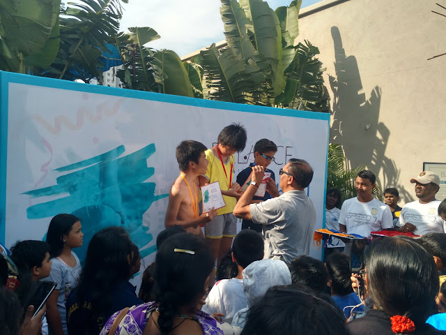 Children recieving medals Children recieving medals