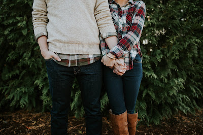 photo of couple wearing plaid clothes