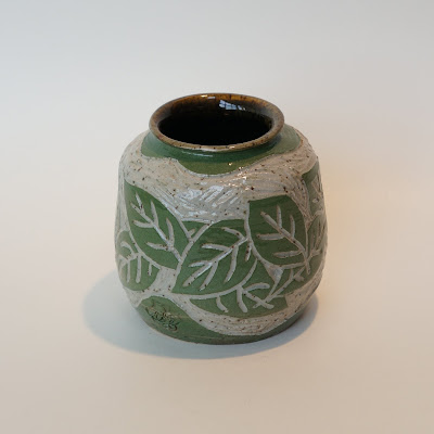 Unique wheelthrown sgraffito pottery ceramic vase with leaf design by Lily.