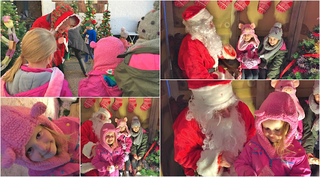 Girls seeing father christmas