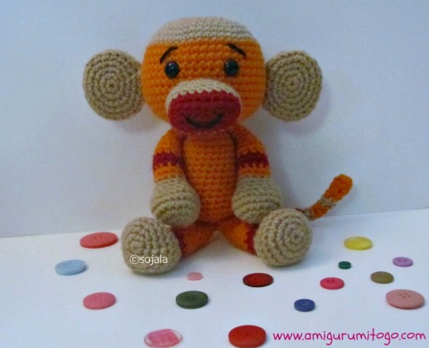 orange crochet sock monkey