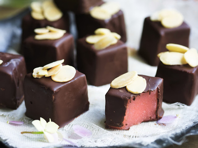 Chocolate and rosewater turkish delight bites garnished with flaked almonds