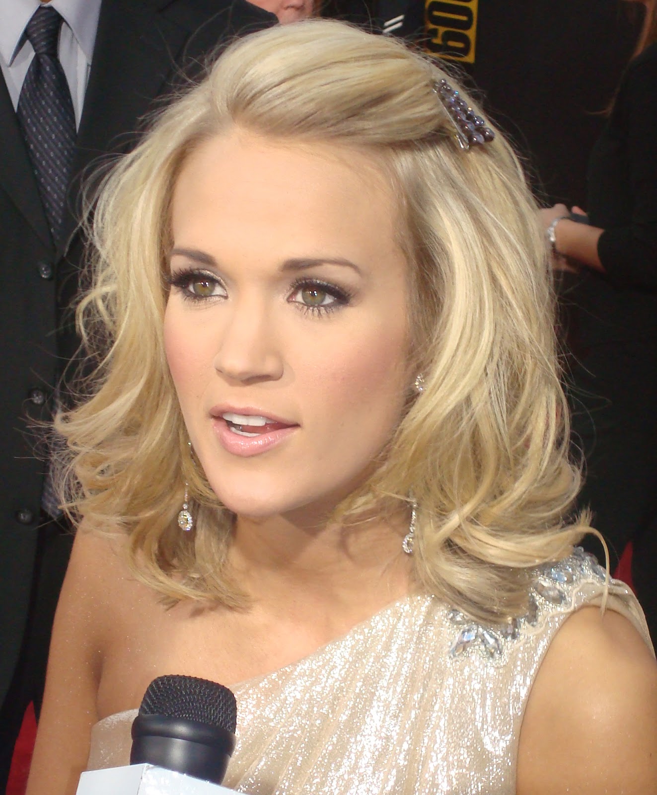 Celebrity Hairstyle: carrie underwood updo hairstyle.