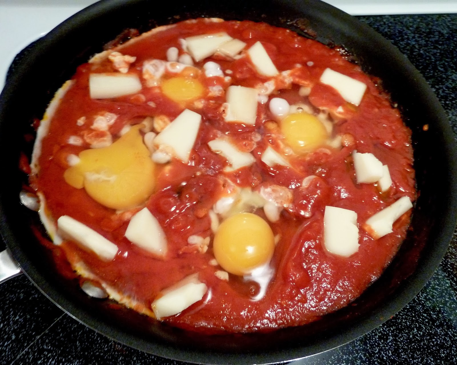 Cracked Pepper Eggs in Tomato Sauce with Smoked Mozzarella
