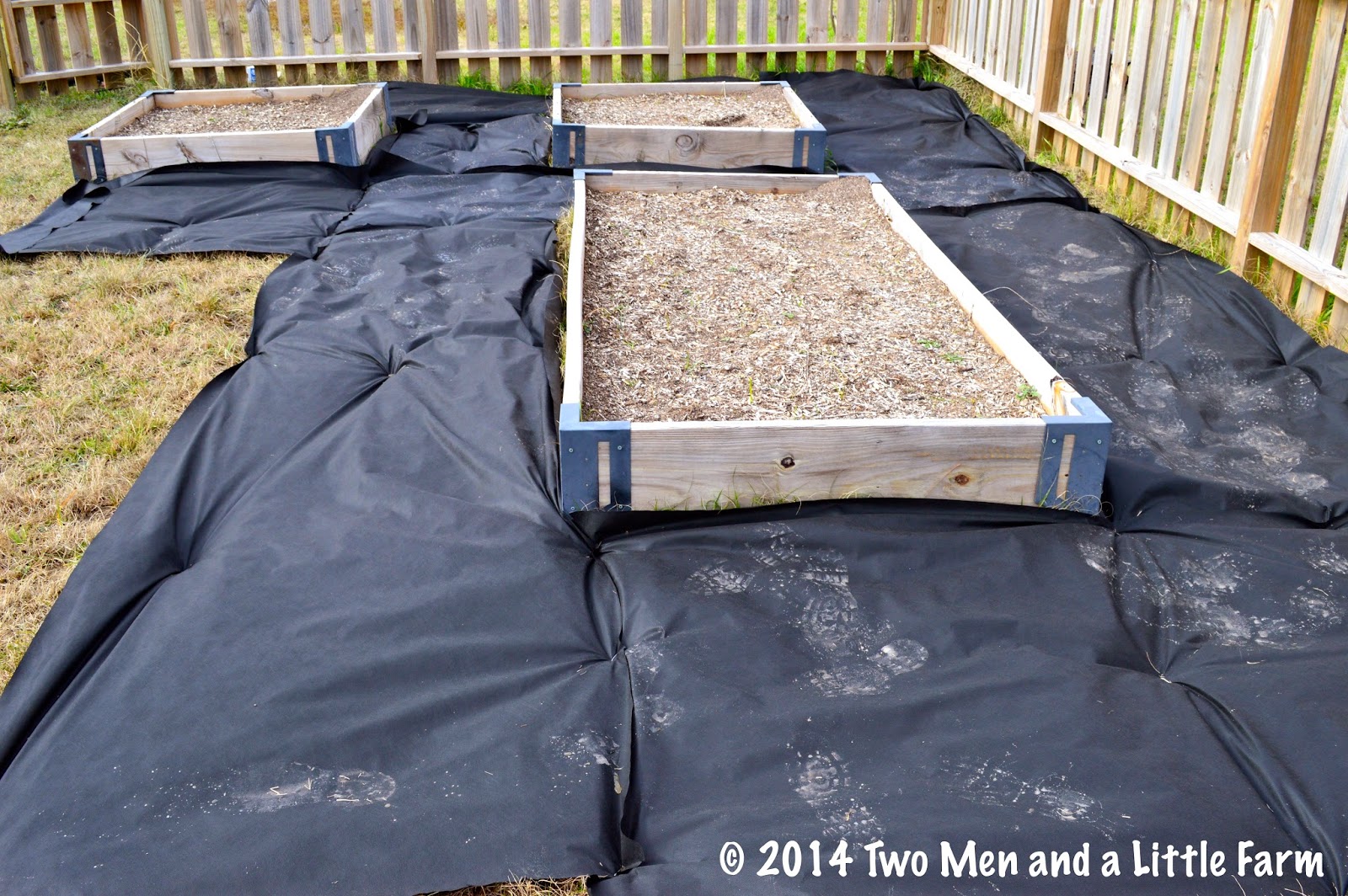 Two Men and a Little Farm WEED BLOCK BETWEEN RAISED BEDS PART ONE