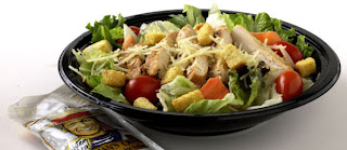 grilled chicken salad with veggies and light dressing on the side - a healthy choice