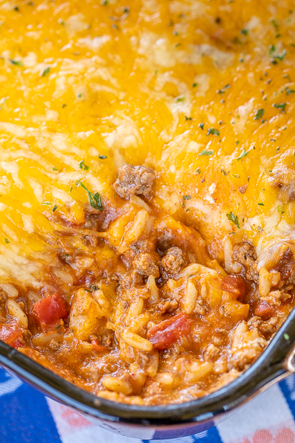 Enchilada Dipping Rice - seriously delicious!! Serve as a dip with chips or as a main dish. Everyone LOVES this yummy Mexican casserole!!! Ground beef, taco seasoning, enchilada sauce, cheese soup, refried beans, rice and cheese. Can make in advance and refrigerate until ready to bake. We make this at least once a month! SO good!!! #mexican #casserole #dip Enchilada Dipping Rice - seriously delicious!! Serve as a dip with chips or as a main dish. Everyone LOVES this yummy Mexican casserole!!! Ground beef, taco seasoning, enchilada sauce, cheese soup, refried beans, rice and cheese. Can make in advance and refrigerate until ready to bake. We make this at least once a month! SO good!!! #mexican #casserole #dip