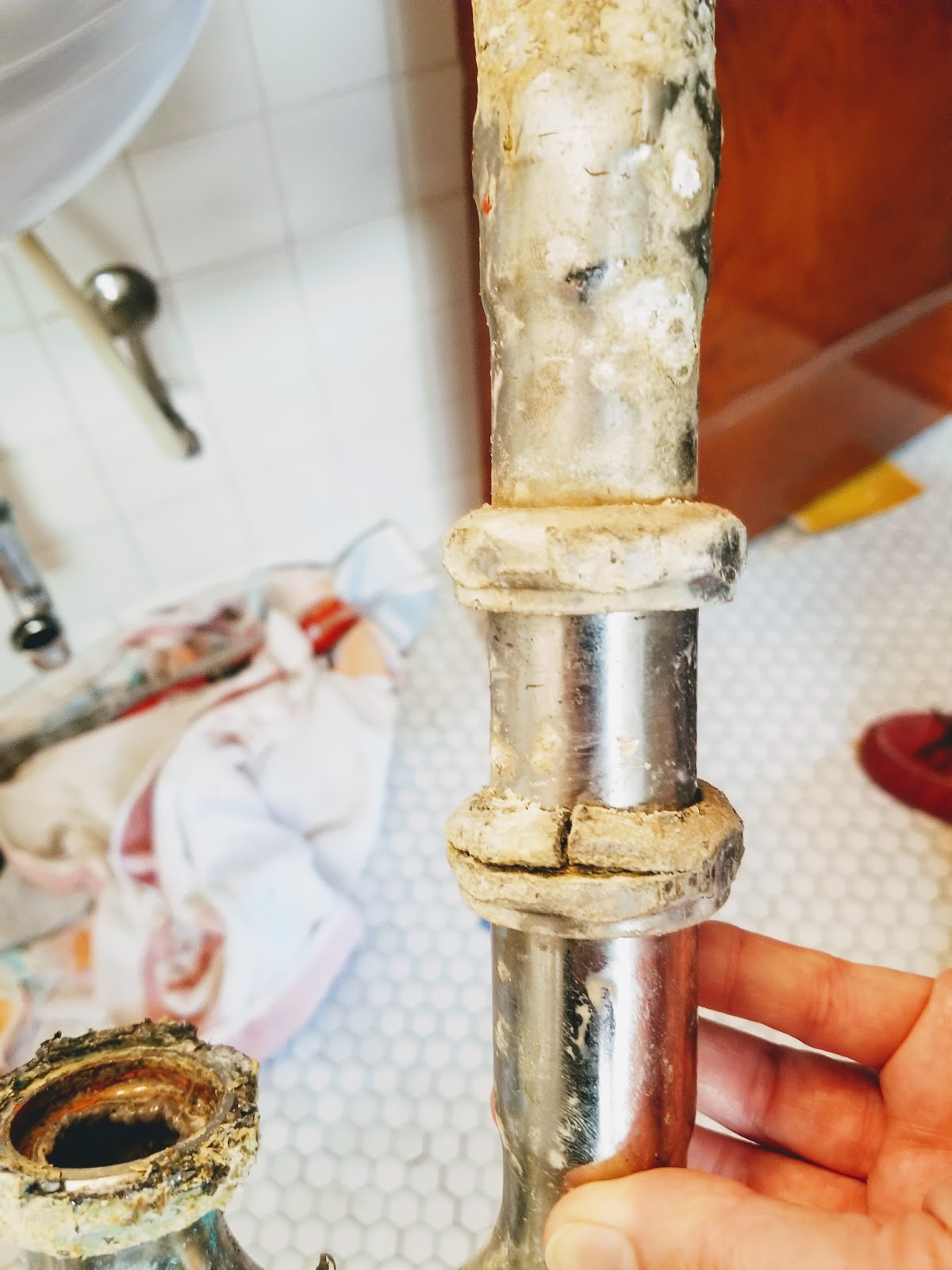 Fixing the Bathroom Sink Drain Pipes