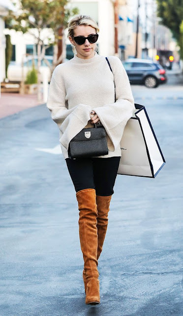 Celebrity street style | Cream sweater with vaporous sleeves and over ...