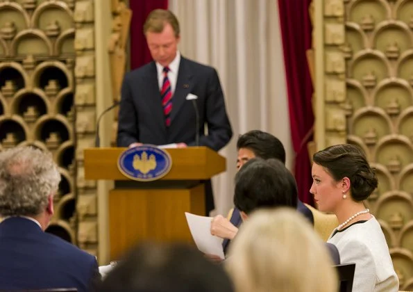 Prime Minister Shinzo Abe and his wife Akie Abe, Grand Duke Henri and Princess Alexandra. Style, silver coat