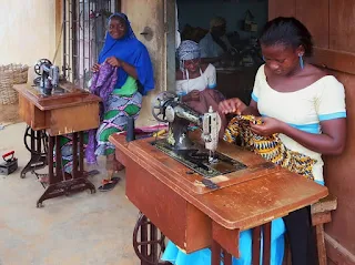 Seamstresses at work at Djamina Couture in Lome Togo