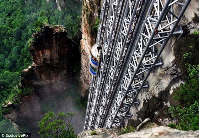 If you suffer from a fear of heights, perhaps this one's not for you.  The Bailong Elevator, also known as the Hundred Dragons Elevator, carries tourists 1,070ft (330m) up the side of a massive sandstone column in a mountain range in China's Hunan Province. Riding the glass lift, which carries up to 50 people at a time or 1,380 an hour, offers jaw-dropping, not to say vertiginous, views down to the bottom of the rocky mountain range in the Wulingyuan area of Zhangijiajie.  Work began on the lift, which cost 120m yuan, or around £12m, in 1999 and finished in 2002. The project met with fierce criticism from environmentalists who were angry that it was sited in the middle of a World Heritage Site.Lift shafts and tunnels had to be dug into the quartz sandstone column chosen from thousands in the area, and earthquake detectors installed so that the lifts (there are three of them) could be evacuated quickly in case of disaster.  Those in favour of the project said that the elevators, which are said to boast the biggest passenger capacity in the world, saved the mountain trails from excess traffic. But protestors said the area, which attracts 5m visitors each year, was already saturated with tourists and did not need another attraction to boost that number further.