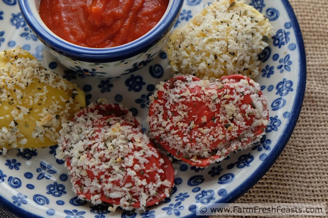 Heart-shaped cheese-filled ravioli dipped in a tangy sauce and coated with seasoned breadcrumbs, then baked. Serve with sauce to dunk and you've got a kid friendly vegetarian Valentine's day meal.