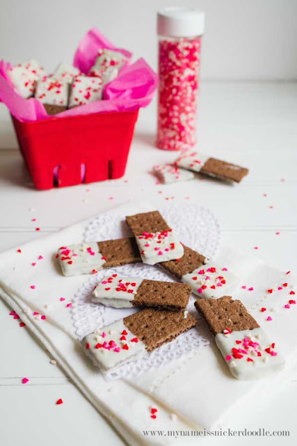 These Valentine Graham Cracker Cookie Sticks are completely easy to make and totally adorable! There's a surprising ingredient, too! Find the how to at mynameissnickerdoodle.com