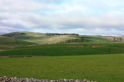 Photo of the distant hills with the sun shining on them