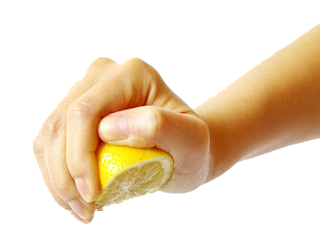 Seasoning food with acid ingredients squeezing lemon juice into a dish to balance out sweetness or spicyness