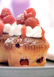 Raspberry cream cupcakes. Classic white sponge cupcakes with raspberries baked in topped with cream and fresh raspberries