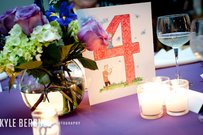 Floral centerpiece and custom tablecard made by the Bride