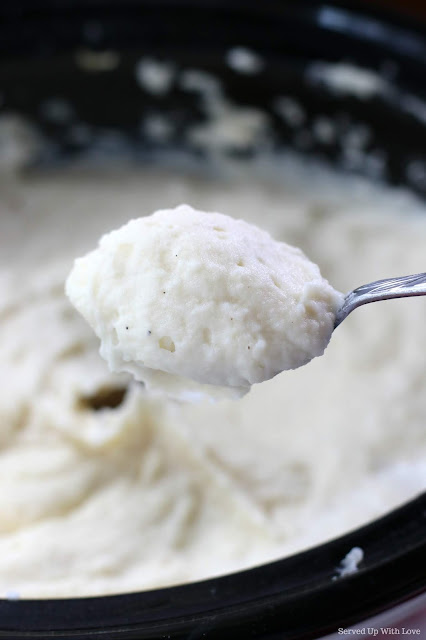 Creamy mashed potatoes on a spoon 