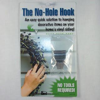 http://www.outerbankscountrystore.com/low-profile-no-drill-no-hole-hook-for-vinyl-siding-set-of-2/
