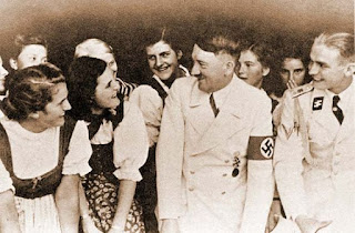 Adolf Hitler smiling worldwartwo.filminspector.com