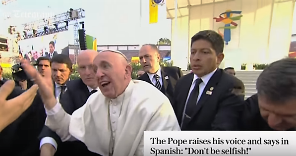 Pontiff scolds well-wisher for being "selfish" after he is pulled down onto a child in a wheelchair.