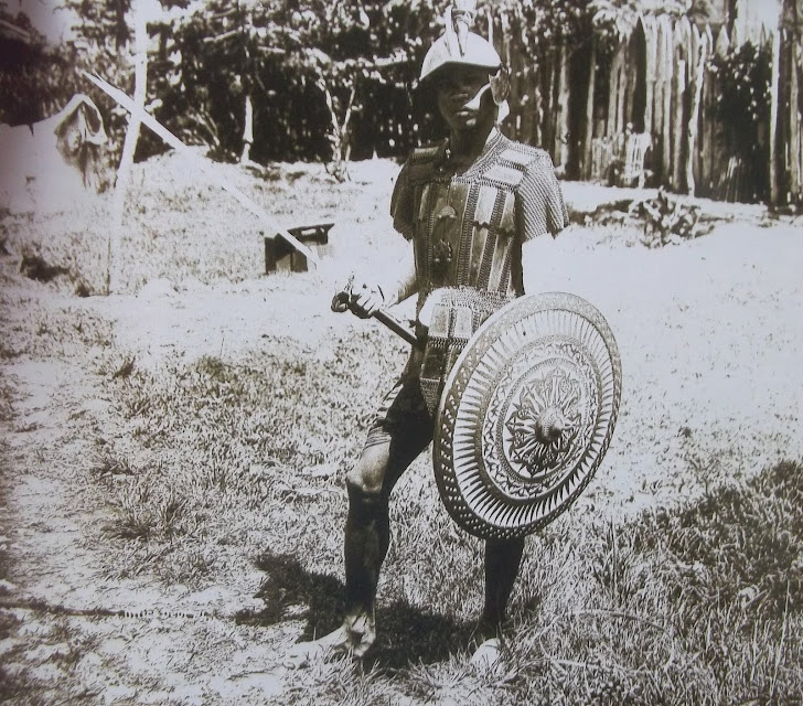 A Muslim warrior in ancient Philippine Muslim Battle Gear with ancient shield and sword