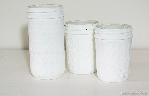 These are GORGEOUS!  Painted and distressed mason jar storage - LITTLE HOUSE OF FOUR. 