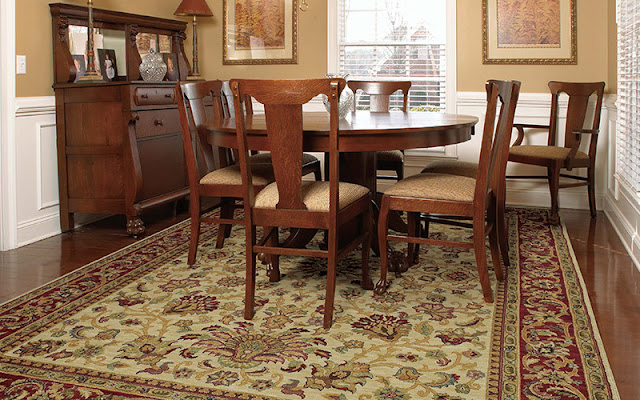 An area rug enhances the look of this dining room