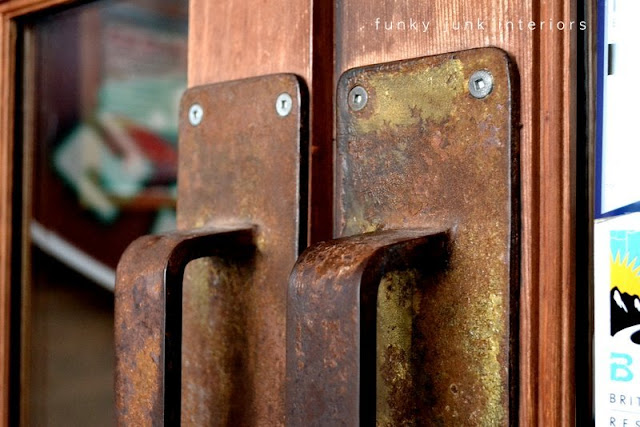 Rusty door pulls at Mission Springs Brewing Company, a junk-filled pub and restaurant.