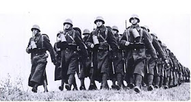 Polish troops (just before WW2) note French gas mask canisters