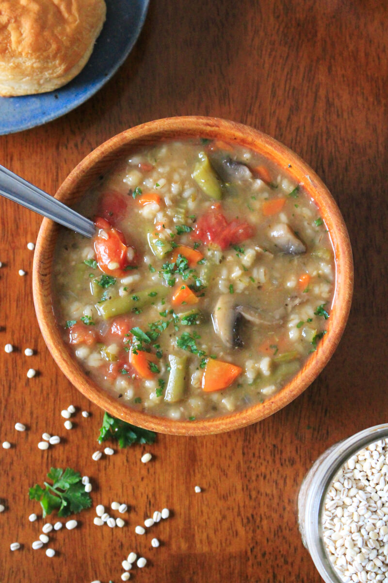 Slow Cooker Vegetable Barley Soup is healthy and nutritious yet hearty and comforting, made with lots of veggies, mushrooms, and pearl barley. #soup #slowcooker #crockpotrecipe