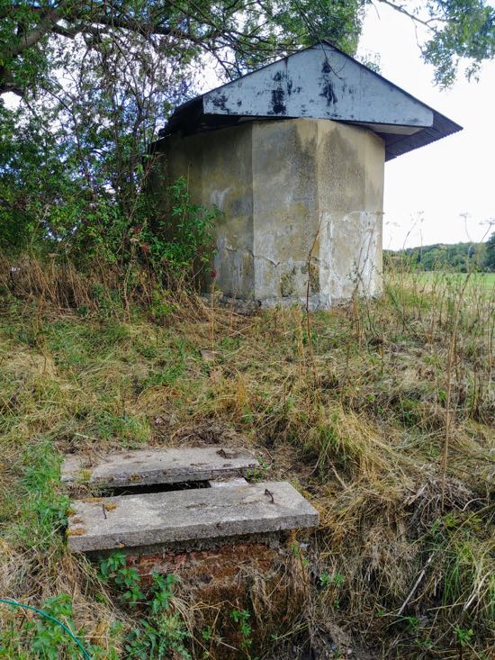 Photograph of The windpump and well at the side of Love Lane, North Mymms Park - August 2018 Image by the North Mymms History Project released under Creative Commons BY-NC-SA 4.0