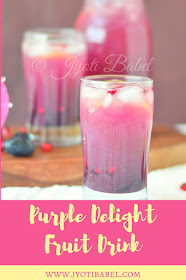 Purple Delight is a summer cooler drink made with fresh grapes and pomegranate juice.