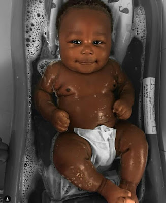  Young African mom celebrates her cute son with the most beautiful black skin