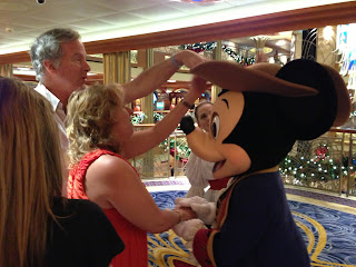 Mike and Gena feeling Mickey's costume