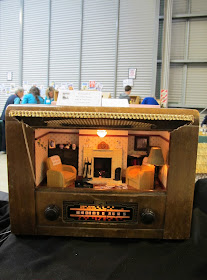 Miniature scene of a 1940s lounge in a vintage radio.