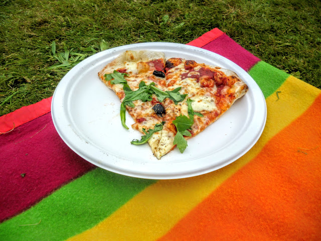 pizza on a picnic mat