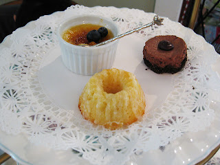 Creme Brulee with fresh blueberries, chocolate cheesecake, and a lemon pound cake