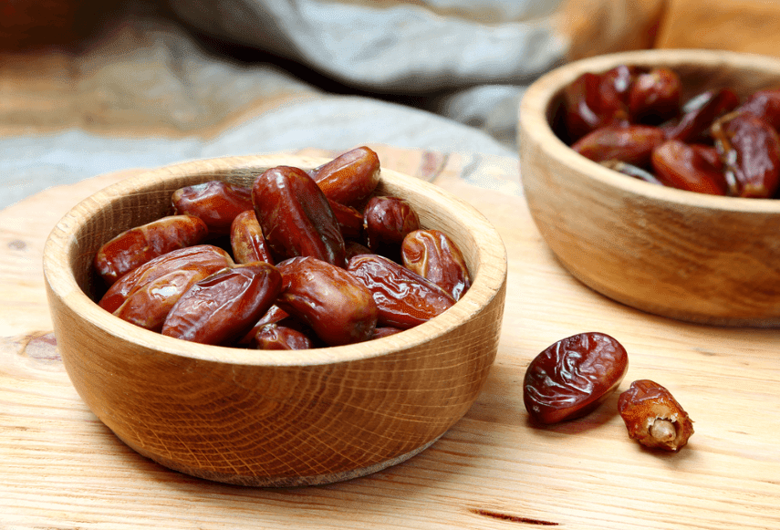 dates in wooden bowl
