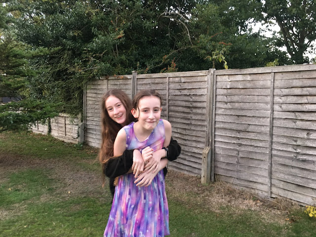 stephs two girls in garden October 2018 siblings
