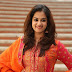 Nanditha Photos In Orange Dress At Movie Success meet