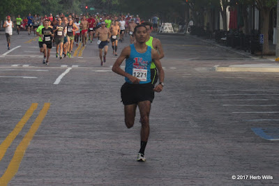 #1271 Chris Haynes (1st, 32:57) on Broad Street during the early stages of the 2017 Rose City Run 10K. Chris Haynes