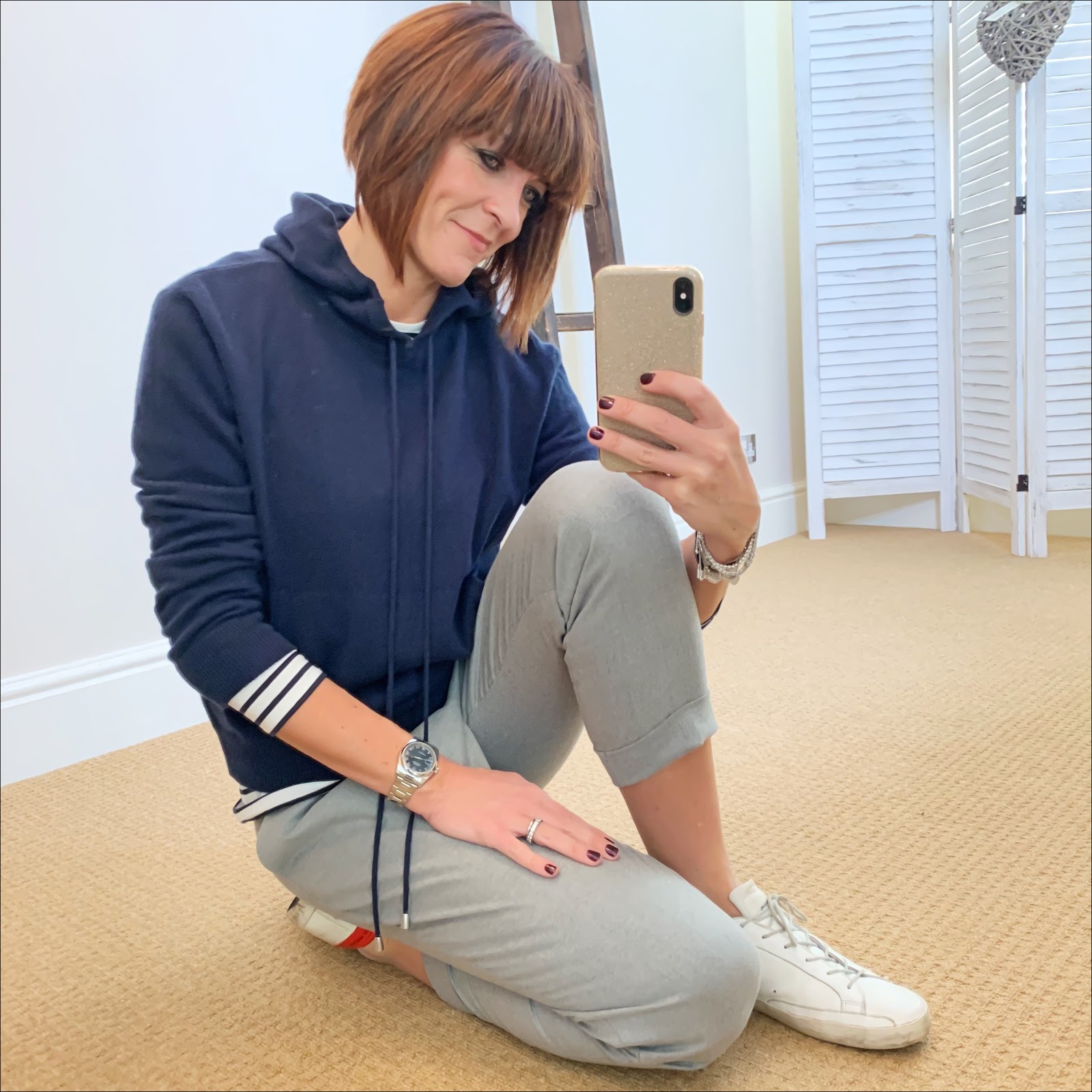 my midlife fashion, marks and spencer pure cashmere hoodie jumper, the white company breton long sleeve top, mango grey pleated trousers, golden goose superstar low top leather trainers